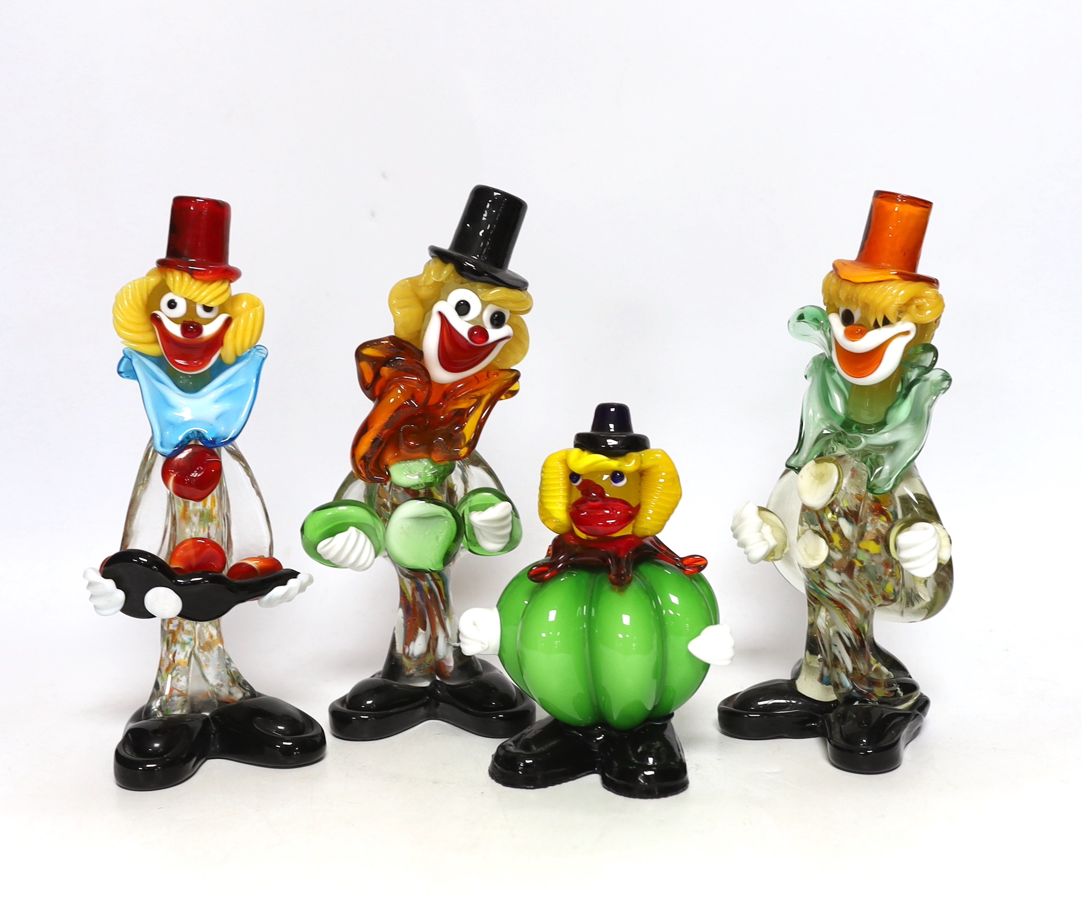 Four Murano glass clowns, largest 22cm high